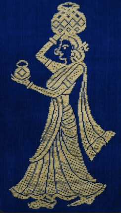 Navy textile with a detailed gold Gollabhama motif